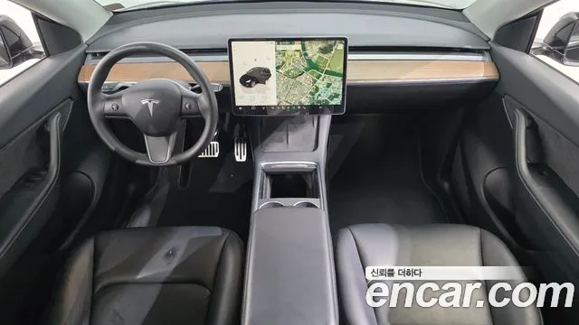 Tesla Model Y — Фото автомобиля 7