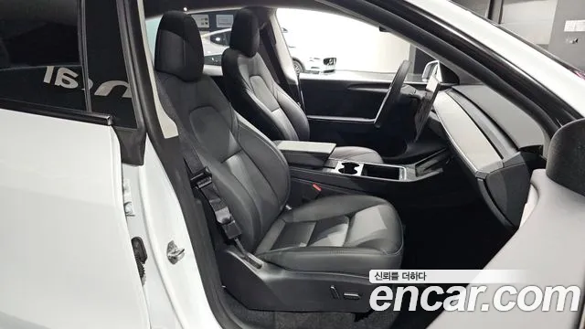 Tesla Model Y — Фото автомобиля 18
