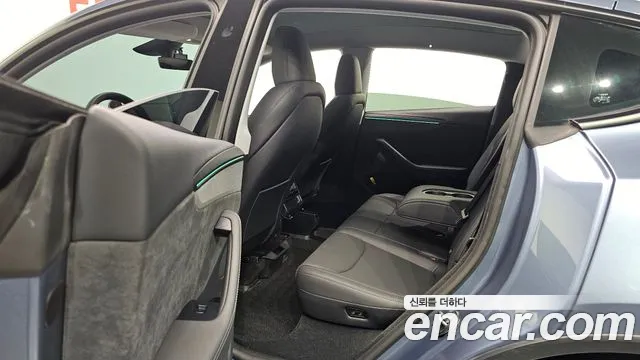 Tesla Model Y — Фото автомобиля 11