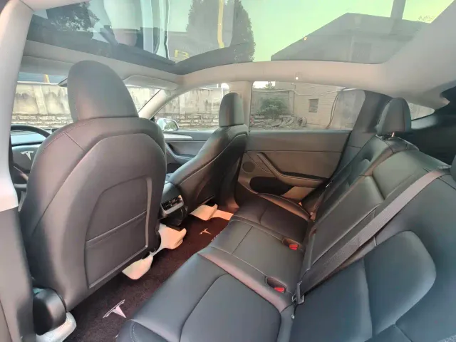 Tesla Model Y — Фото автомобиля 14
