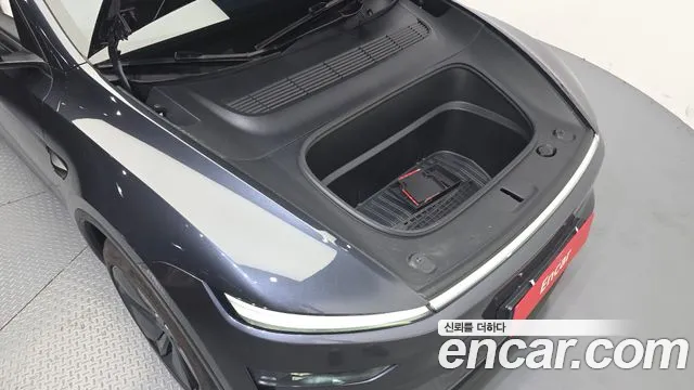 Tesla Model Y — Фото автомобиля 9