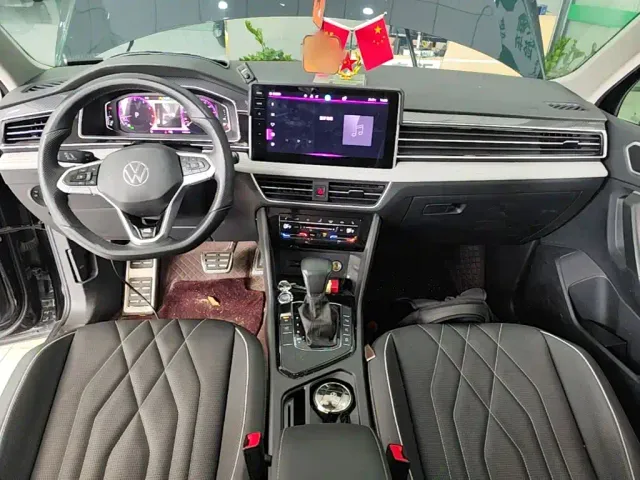 Volkswagen Tiguan L — Фото автомобиля 9