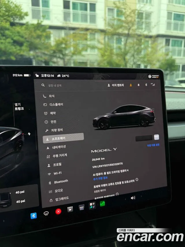 Tesla Model Y — Фото автомобиля 12