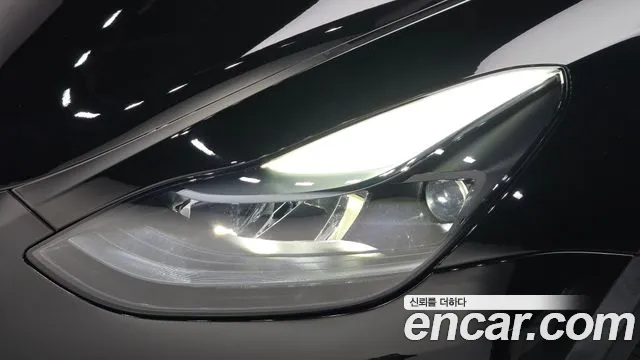 Tesla Model Y — Фото автомобиля 7