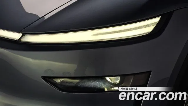 Tesla Model Y — Фото автомобиля 21