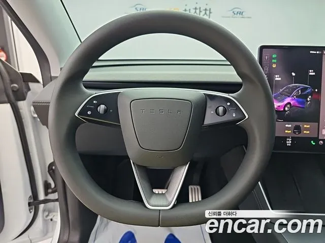 Tesla Model Y — Фото автомобиля 6