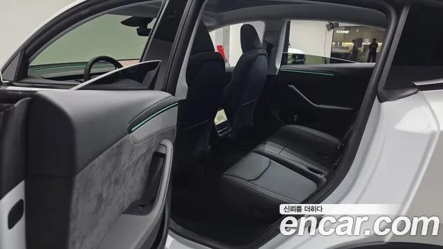 Tesla Model Y — Фото автомобиля 25
