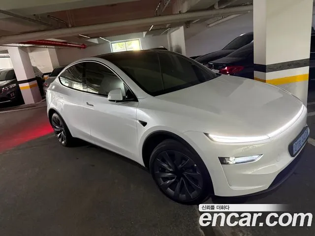 Tesla Model Y — Фото автомобиля 7
