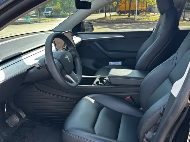 Tesla Model Y — Фото автомобиля 7