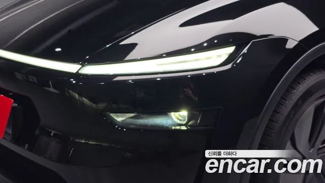 Tesla Model Y — Фото автомобиля 7