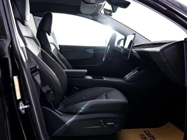 Tesla Model Y — Фото автомобиля 19