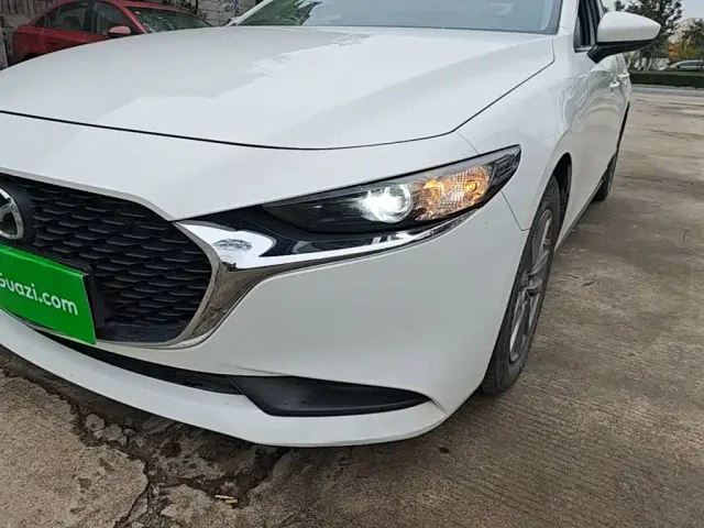 Mazda Axela — Фото автомобиля 23