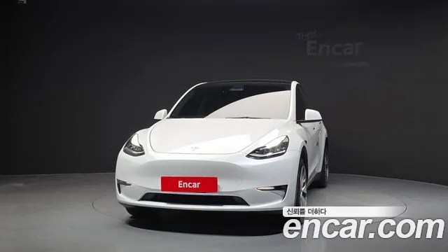 Tesla Model Y — Фото автомобиля 3
