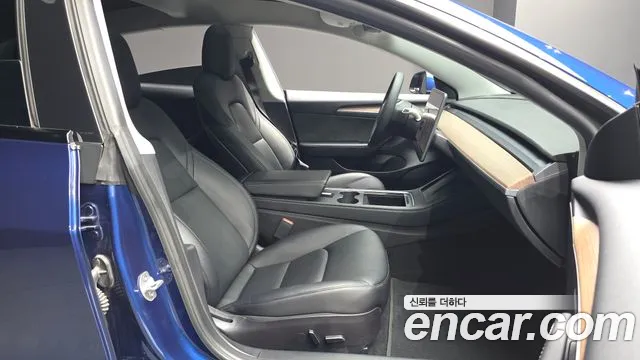 Tesla Model 3 — Фото автомобиля 17