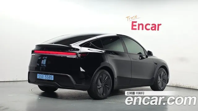 Tesla Model Y — Фото автомобиля 2