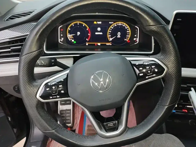 Volkswagen Tiguan L — Фото автомобиля 10