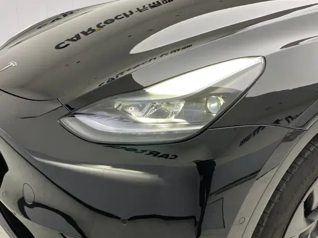 Tesla Model Y — Фото автомобиля 9