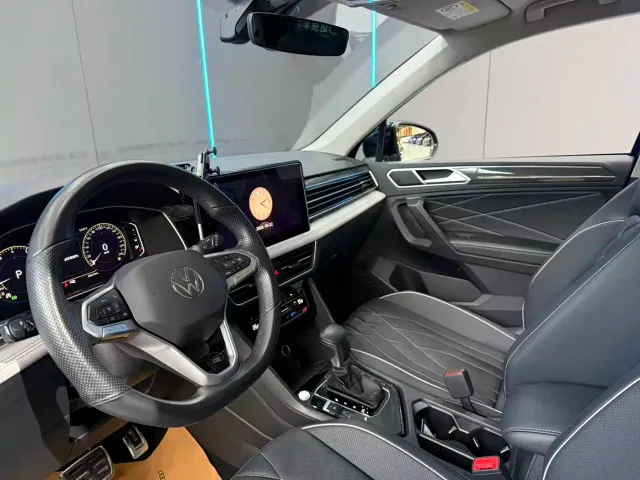 Volkswagen Tiguan L — Фото автомобиля 11