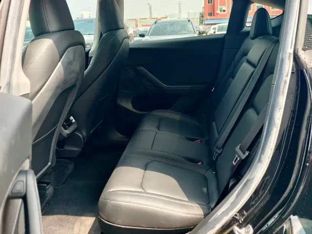 Tesla Model Y — Фото автомобиля 20