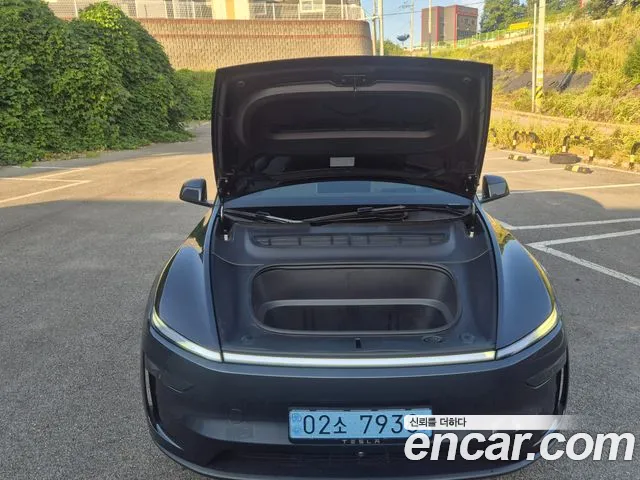 Tesla Model Y — Фото автомобиля 6