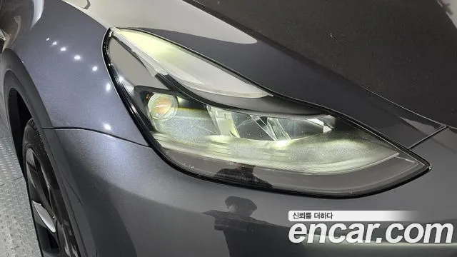 Tesla Model Y — Фото автомобиля 7