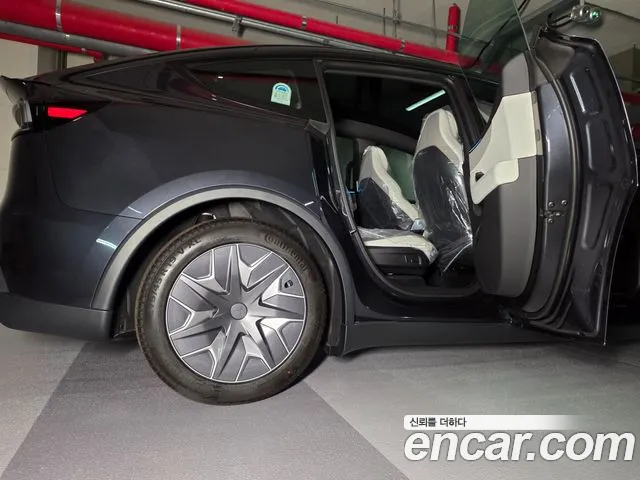 Tesla Model Y — Фото автомобиля 5