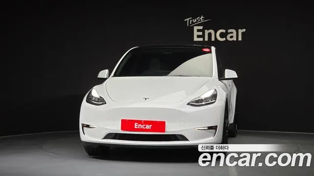 Tesla Model Y — Фото автомобиля 3