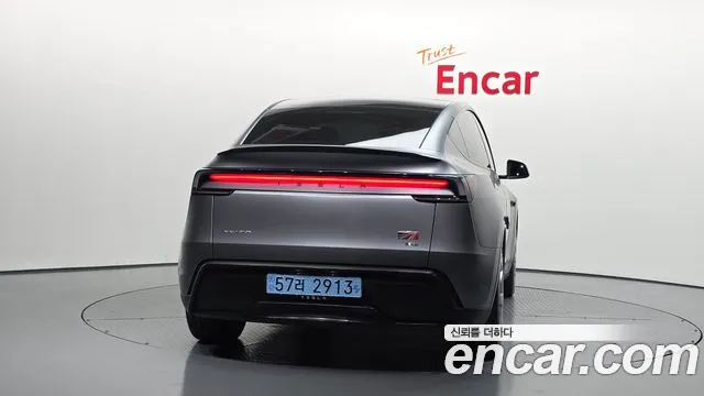 Tesla Model Y — Фото автомобиля 4