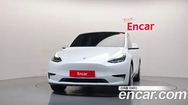 Tesla Model Y — Фото автомобиля 3