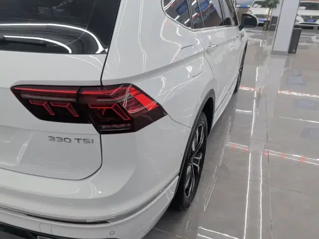 Volkswagen Tiguan L — Фото автомобиля 7