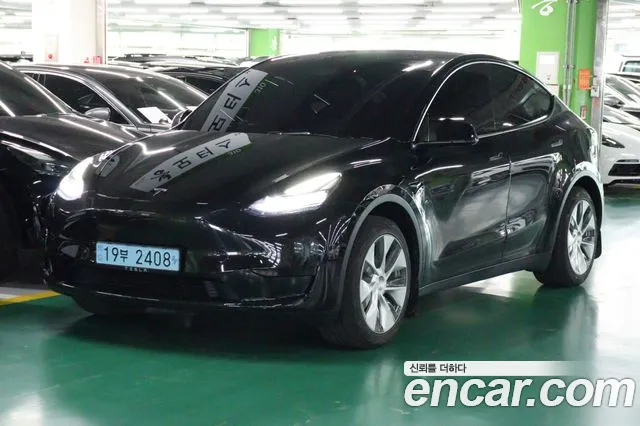 Tesla Model Y — Фото автомобиля 2