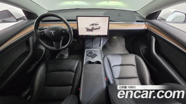 Tesla Model 3 — Фото автомобиля 6