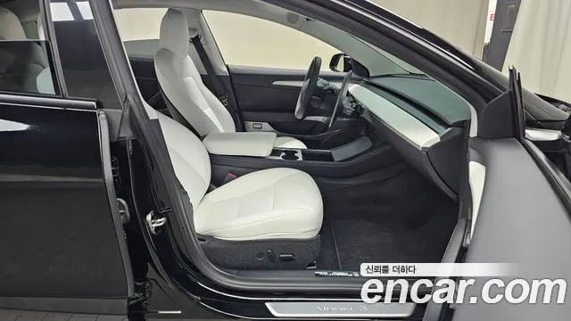 Tesla Model 3 — Фото автомобиля 16