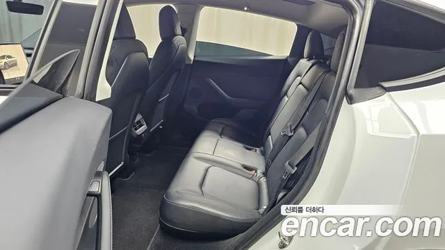 Tesla Model Y — Фото автомобиля 25