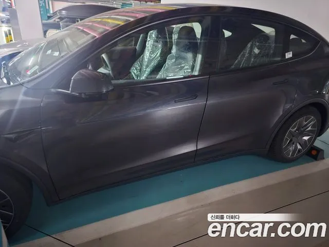 Tesla Model Y — Фото автомобиля 6