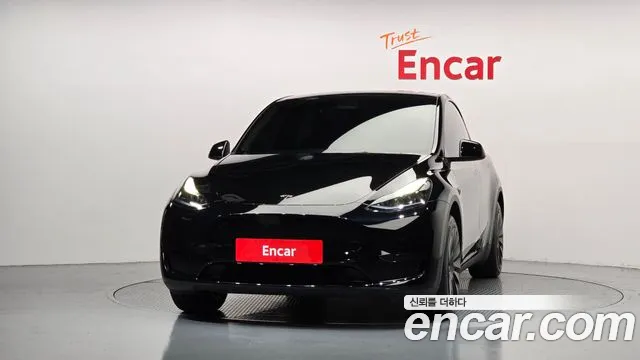Tesla Model Y — Фото автомобиля 3