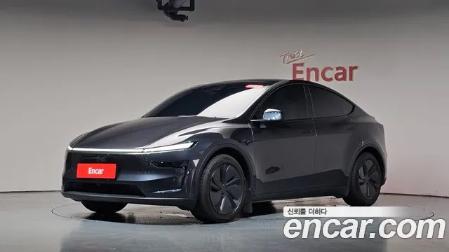Tesla Model Y — Фото автомобиля 9