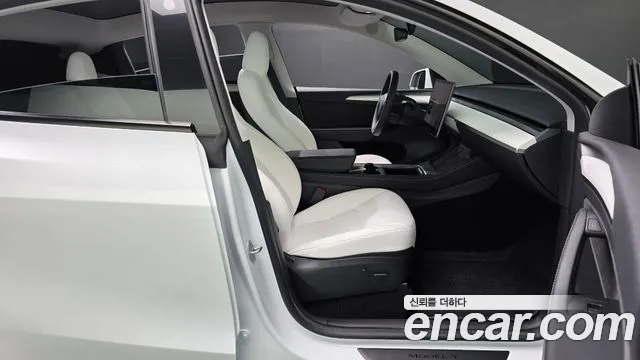 Tesla Model Y — Фото автомобиля 15