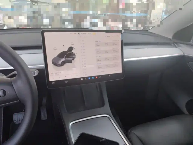 Tesla Model Y — Фото автомобиля 9
