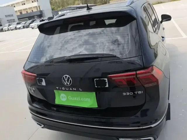 Volkswagen Tiguan L — Фото автомобиля 5