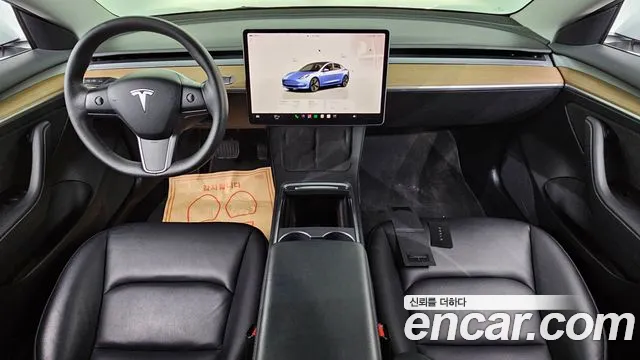 Tesla Model 3 — Фото автомобиля 7