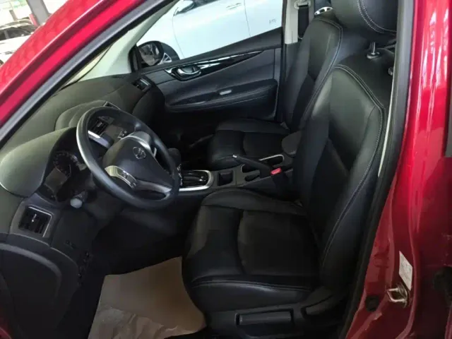 Nissan Tiida — Фото автомобиля 14