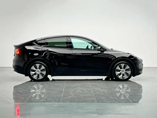 Tesla Model Y — Фото автомобиля 7