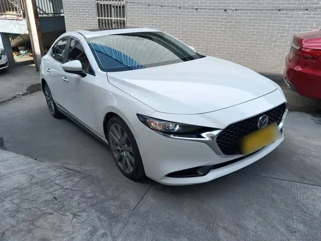 Mazda Axela — Фото автомобиля 21