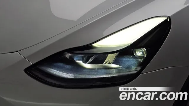 Tesla Model Y — Фото автомобиля 7