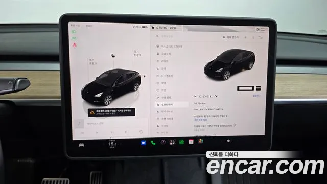 Tesla Model Y — Фото автомобиля 8