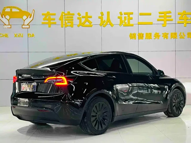Tesla Model Y — Фото автомобиля 3