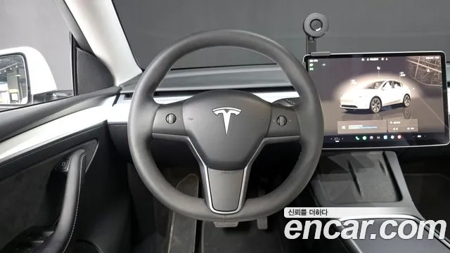 Tesla Model Y — Фото автомобиля 13