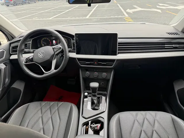 Volkswagen Tiguan L — Фото автомобиля 23