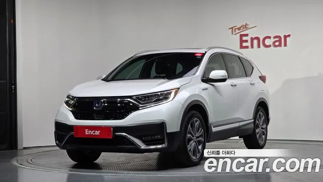Фотография автомобиля — Honda CR-V CR-V 5-е поколение 2.0 гибрид Touring 4WD